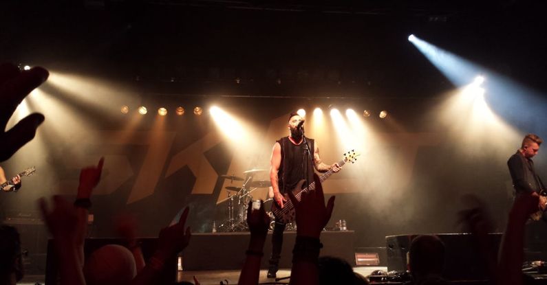 Sound And Lighting - Person Playing Guitar on Stage