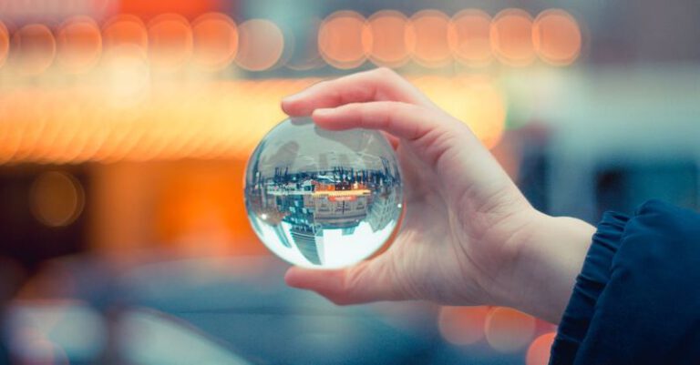 Interaction - Person Holding Round Glass Ball Macro Shot