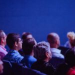 Event - People Sitting on Gang Chairs