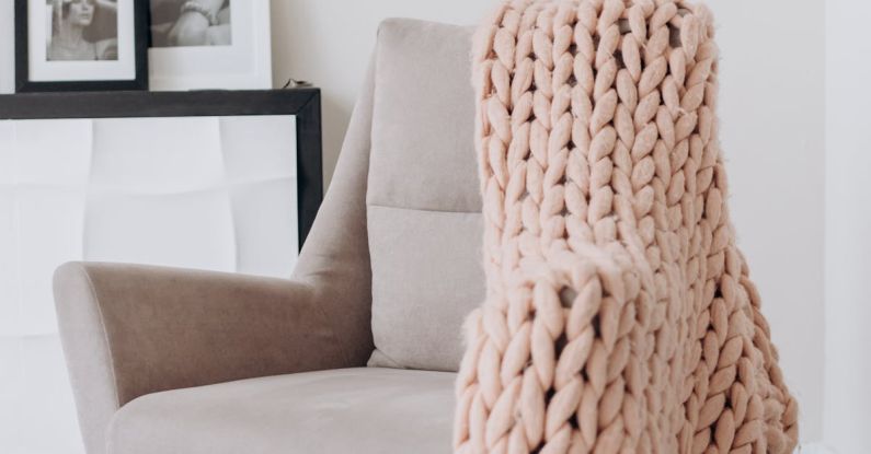 Comfortable Seating - White and Brown Armchair Beside White Wall