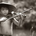 Talent - Grayscale Photography of Boy Playing Violin